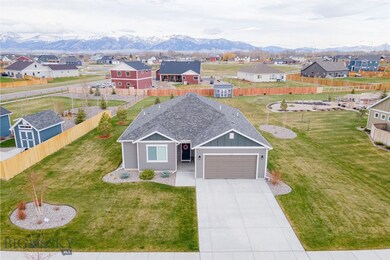 Front of house. Bridger Mtns in background.