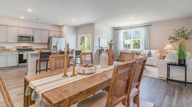 Dining area with recessed lighting, visible vents,