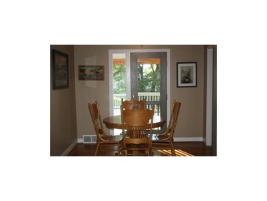 The dining area walks out onto covered deck area.