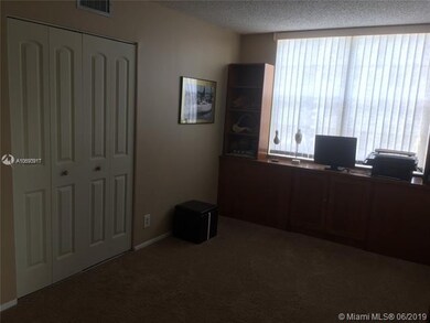 3rd bed room den, showing ample closet.
