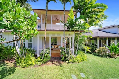Palm trees hug your outdoor lanai spaces on both l
