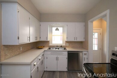 New Tile, Paint, remodeled Cabinetry