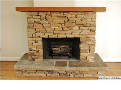 FOYER SHOWING OPEN PLAN.  GREAT ROOM W/  ROCK FIRE