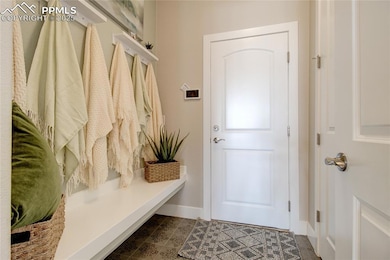 Mudroom featuring tile patterned floors