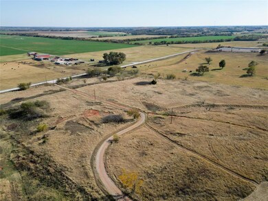 Aerial view of property and surrounding area with rural landscape