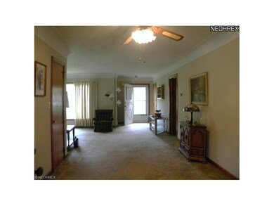 Foyer area off great room. Hardwood floors under c