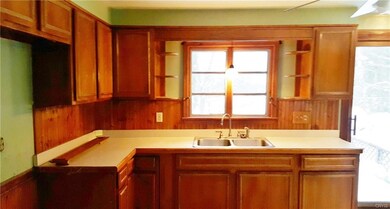 Kitchen may have been done in the 1980's.  Newer k