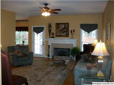 Spacious Family Room with fireplace and hardwood f