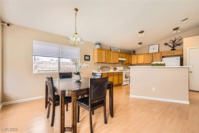 Dining space with light wood-style looking floors,