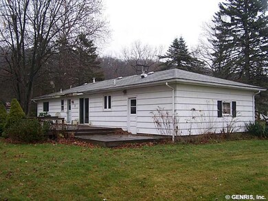 Exterior Back. Large deck.