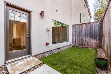First floor fenced outdoor area with turf.  Access