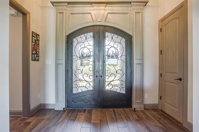 Double metal doors with privacy glass and detailed trim to add that touch of elegance.