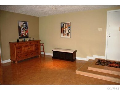 Formal dining room with wood parquet floor and rec