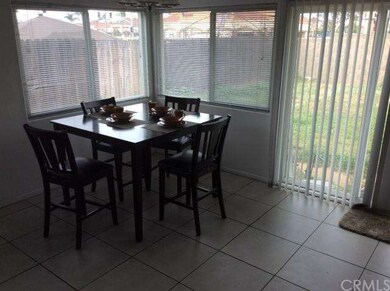 BREAKFAST NOOK/EATING AREA NEXT TO KITCHEN.