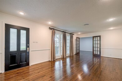 You are welcomed to a formal living room with fren