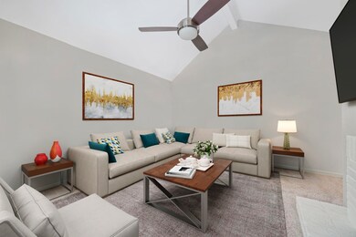 Virtually Staged: Spacious living room with carpet