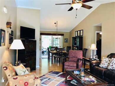 OPEN CONCEPT LIVING ROOM, DINING ROOM AND KITCHEN