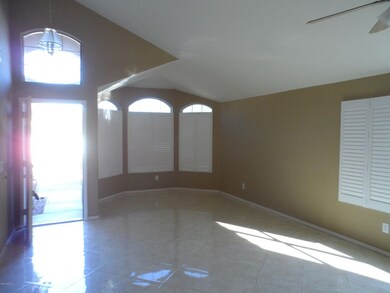 LARGE LIVING RM, TILE, VAULTED CEILING,