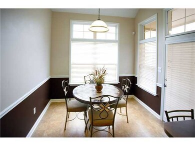 Breakfast area off of kitchen.  Large windows allo