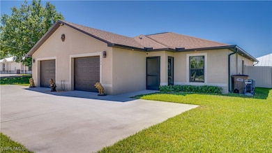 Single story home featuring driveway, stucco siding, fence, an attached garage, and a front​​‌​​​​‌​​‌‌​​​‌​​‌‌​‌‌​​​‌‌‌​​​​‌​​​​​‌ lawn