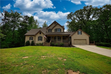 View of front of house featuring a porch, concrete
