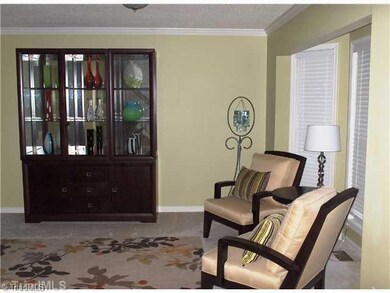 Living Room. Nice sitting/entertaining area that is open to the dining room.