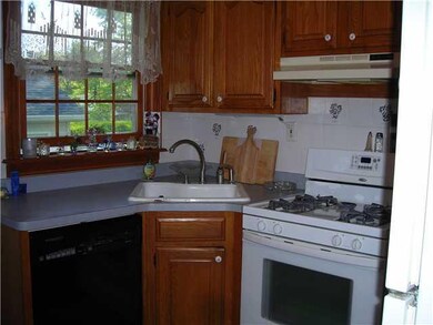 Kitchen. corner sink.beautiful Anderson windows. C