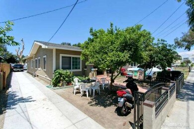 Extra long driveway leading to cemented backyard.