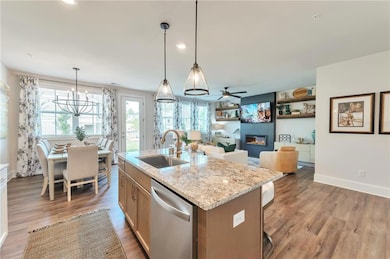 The dining room perfectly blends style and functionality, featuring an open-concept design ideal for modern living.