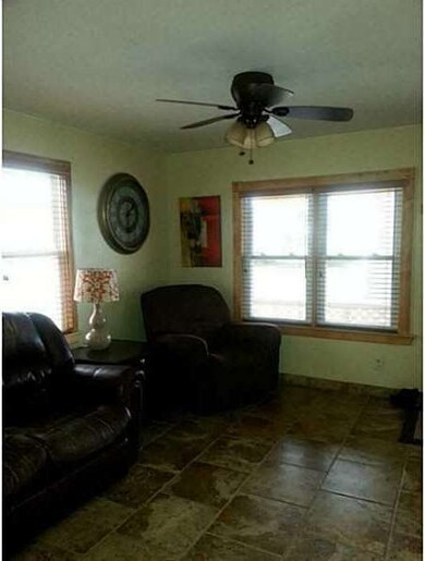 Living Room CEILING FANS AND ITALIAN TILE