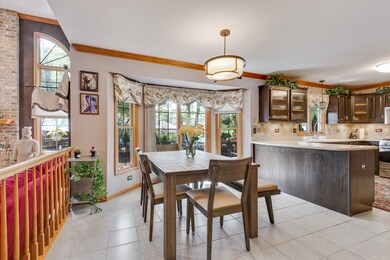 Eating area is between kitchen and family room.  I