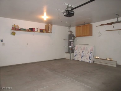 Garage with a garage door opener and secured water