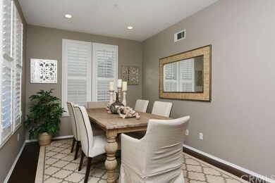 Dining room with updated laminate hardwood floors 
