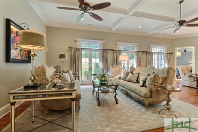 Three large french doors w/ transoms ensure abunda