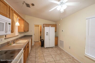 2116 Spring Creek Cir NE, Palm Bay, FL 32905 - photo 6