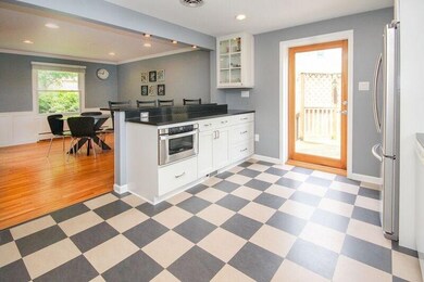 This open concept kitchen adds a flow to an casual