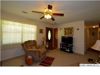 Living room is large and comfortable with lots of 