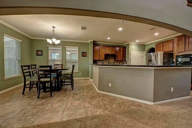 Breakfast area that is open to kitchen and family room.