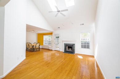 Great Room with Vaulted Ceiling, Skylights & Firep