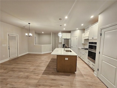 5030 Sierra Creek Dr NE, Hoschton, GA 30011 - photo 7