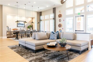 Living room with hardwood / wood-style flooring an