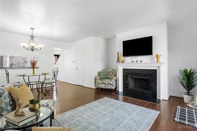 Open concept + cozy fireplace. TV conveys.