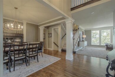 Grand 2-story entry with adjacent formal dining.