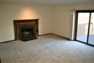 Living Room with Wood Burning Fireplace