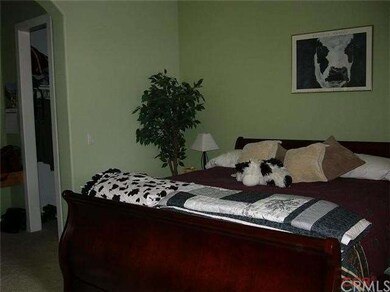 Master bedroom with his and hers closets