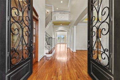 Step through the grand double leaded-glass doors i