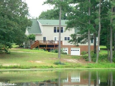 Exterior Front - 2.5 acre pond to the back of your