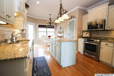 GRANITE, HARDWOODS AND MORE!  LOOK AT THE LAYOUT OF THIS KITCHEN!  NOT PICTURED IS THE PANTRY!