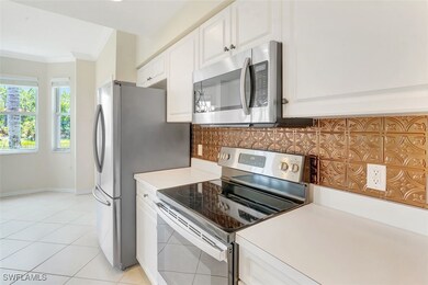 Kitchen with appliances with stainless steel finis