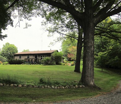 1571 W Woodland Park Dr, Bitely, MI 49309 - photo 2